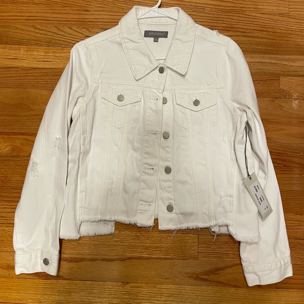 White destroyed jean jacket.